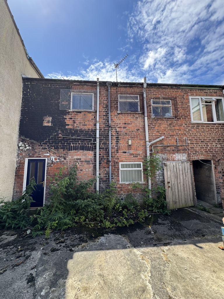 Rear of the building with original brickwork