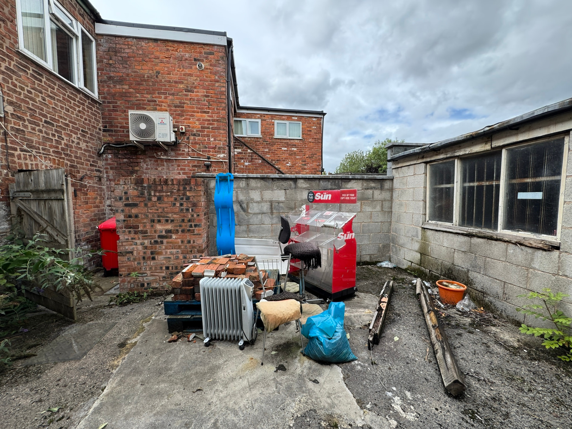 Rear yard with garages and storage